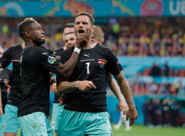 Marko Arnautovic (right) celebrates