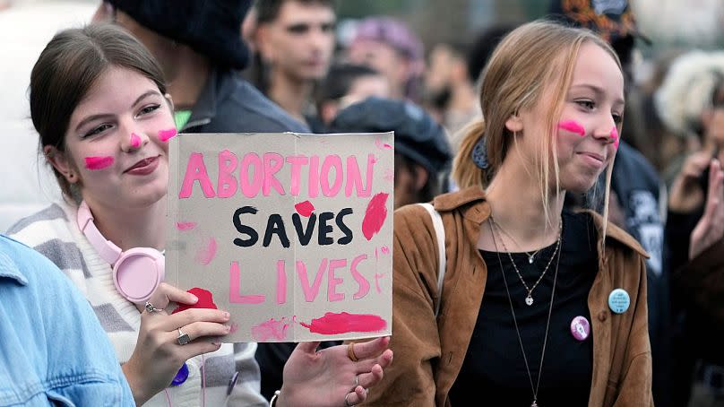 People stage a protest on 'International Safe Abortion Day' in Milan, Wednesday, Sept. 28, 2022.