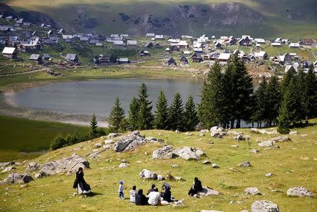 Tourists from the Middle East enjoy along the Prokosko Lake near Fojnica, Bosnia and Herzegovina, August 20, 2016. REUTERS/Dado Ruvic