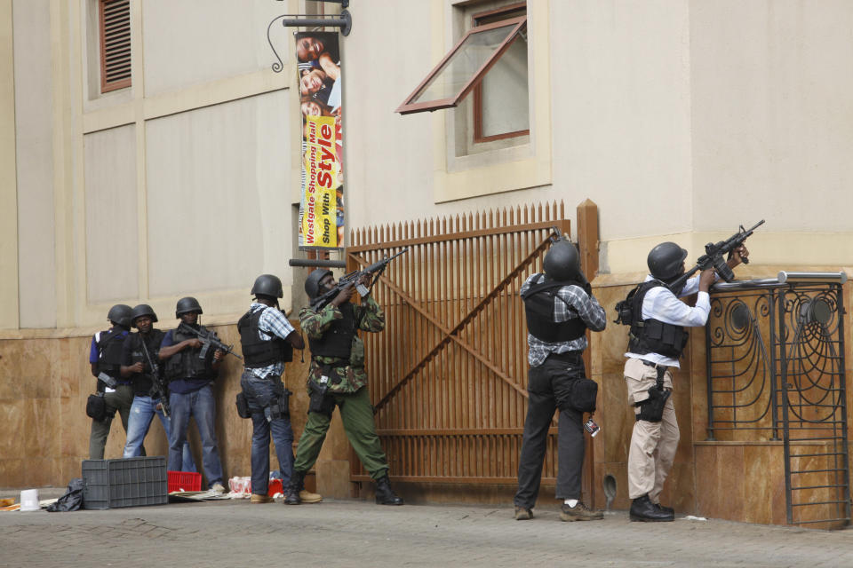 FILE - In this Saturday, Sept. 21, 2013 file photo, armed special forces aim their weapons at the Westgate Mall in Nairobi, Kenya after gunmen threw grenades and opened fire during an attack that left multiple dead and dozens wounded. Kenya's lead counterterrorism agency is working to stop another Westgate Mall-style terrorist attack that many here believe Somali militants will try again, but the anti-terror unit is struggling to do its work because of limited funds, according to a security official from the police headquarters. (AP Photo/Khalil Senosi, File)