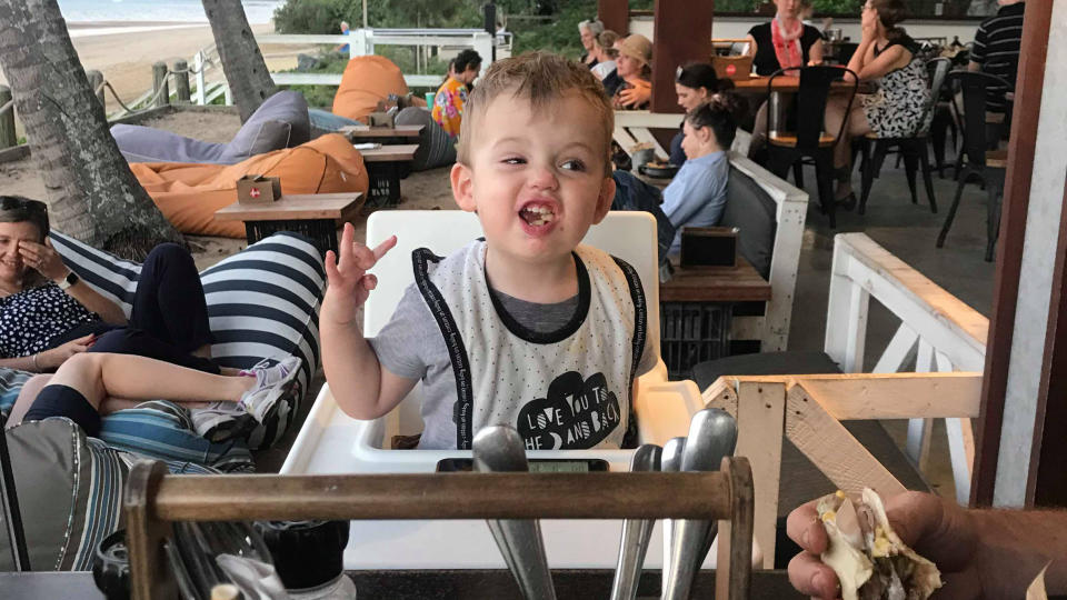 Young Archie, 18 months, had no complaints about the meal his family were given on the house at Riccardos Italiano. Source: Mathew Ferguson