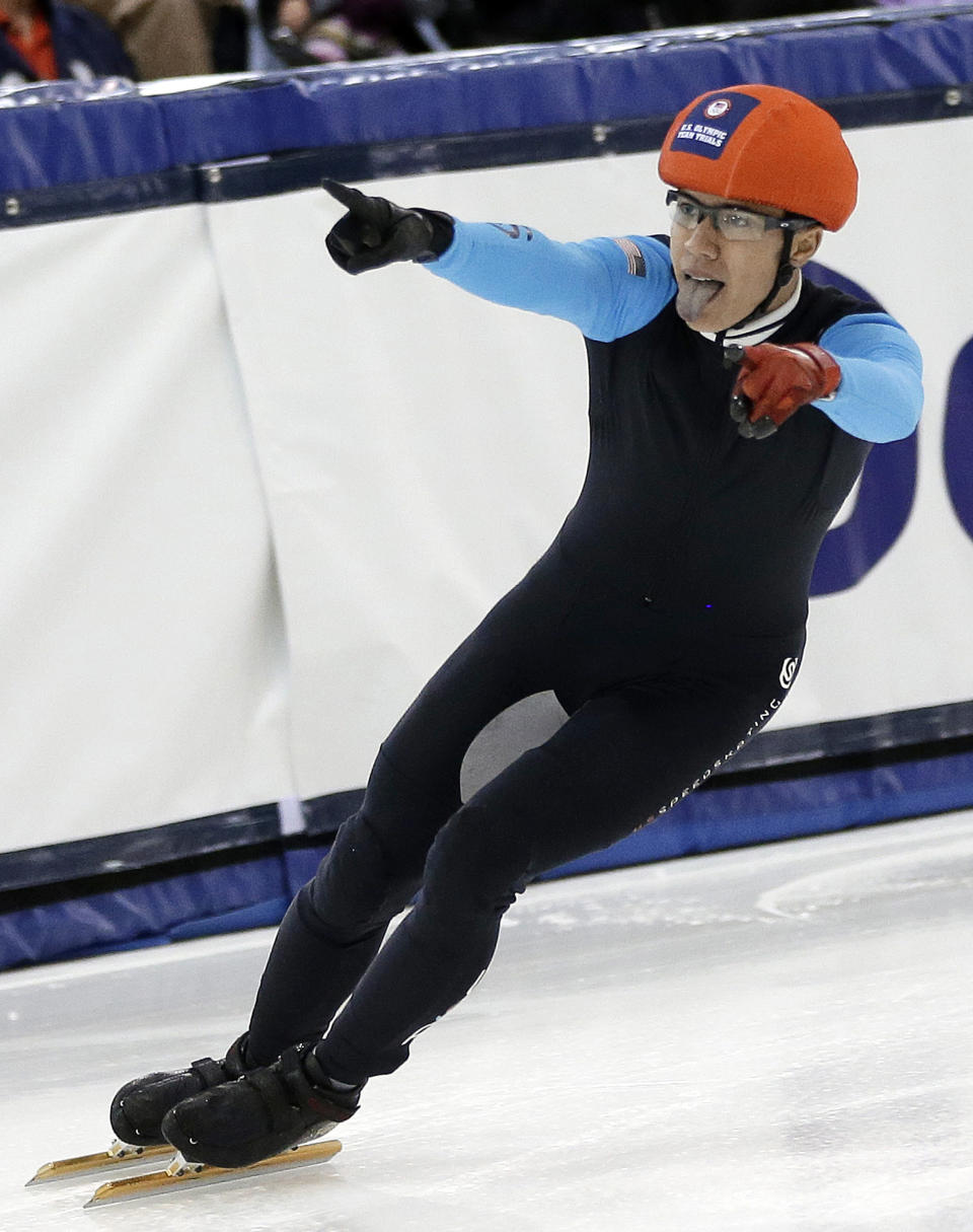 J.R. Celski reacts to the crowd after a race in the men's 1,500 meters during the U.S. Olympic short track speedskating trials Friday, Jan. 3, 2014, in Kearns, Utah. (AP Photo/Rick Bowmer)