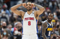 Detroit Pistons forward Trey Lyles reacts after the Pistons were called for a foul late in the second half of an NBA basketball game against the Denver Nuggets Sunday, Jan. 23, 2022, in Denver. (AP Photo/David Zalubowski)