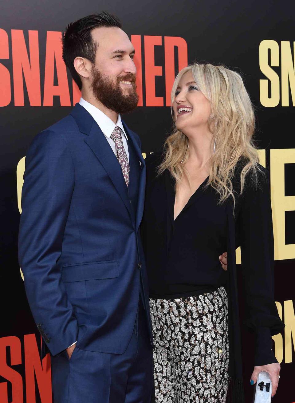 Kate Hudson and Danny Fujikawa arrive at the premiere of 20th Century Fox's 'Snatched' at Regency Village Theatre on May 10, 2017 in Westwood, California