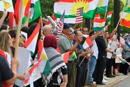 A crowd of over 500 people protest in support of Kurds after the Trump administration changed its policy in Syria