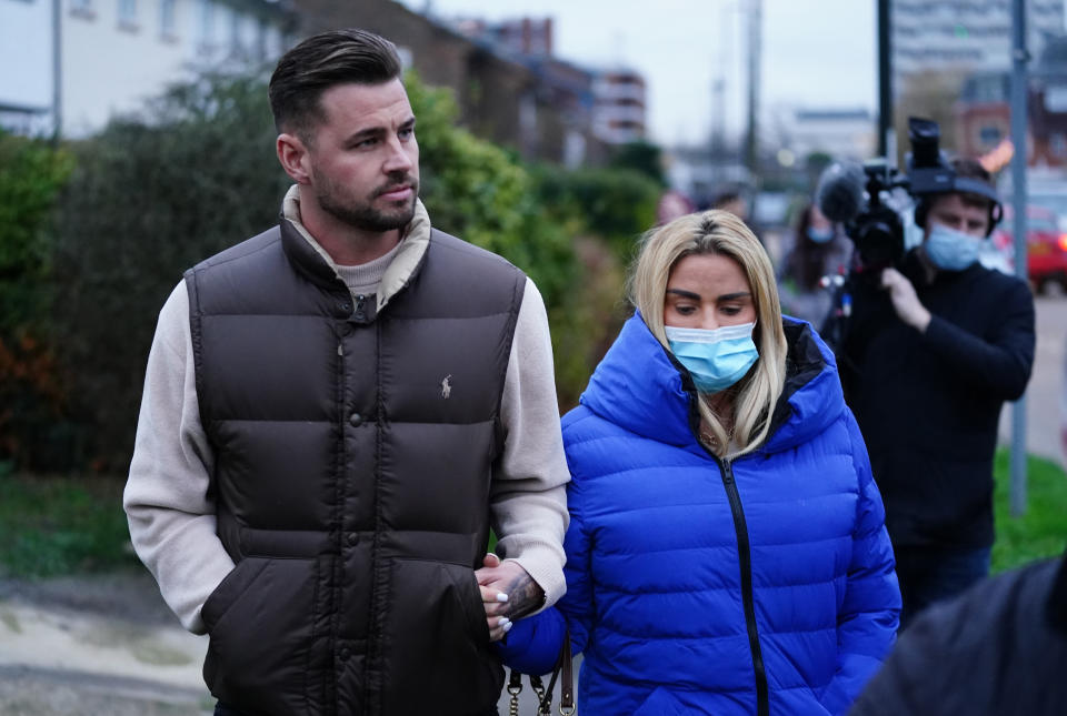 Katie Price with Carl Woods leaving Crawley Magistrates' Court in West Sussex after she was handed a 16-week suspended jail sentence for drink-driving while disqualified and without insurance following a crash near her home in Sussex. The former glamour model, 43, was also banned from driving for two years over the collision on the B2135 near Partridge Green on September 28. Picture date: Wednesday December 15, 2021. (Photo by Ian West/PA Images via Getty Images)