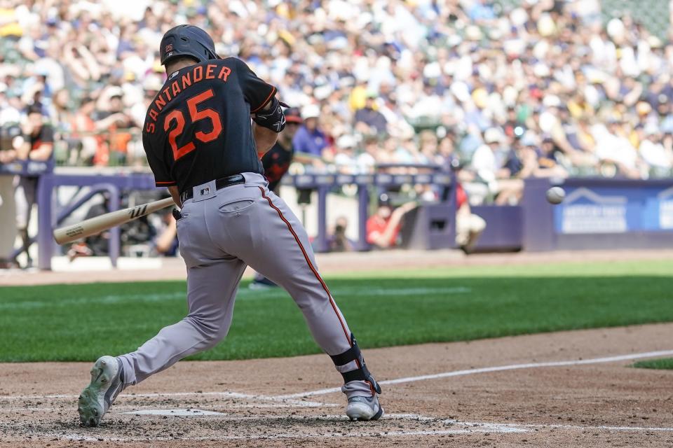 Baltimore Orioles' Anthony Santander hits an RBI double during the eighth inning of a baseball game against the Milwaukee Brewers Thursday, June 8, 2023, in Milwaukee. (AP Photo/Morry Gash)