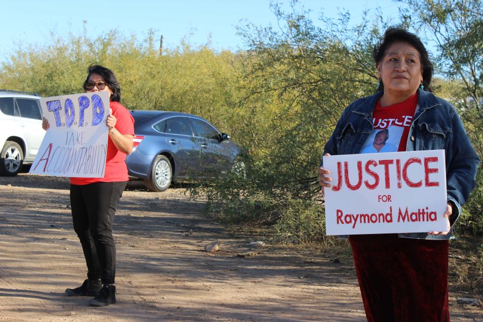 The family of Raymond Mattia and attendees gather outside of the Tohono O'odham Nation Police Department in Sells, Arizona, for a peaceful protest calling for more accountability from the department on Friday, December 15, 2023.