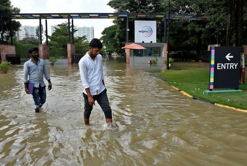 FILE PHOTO: Water recedes in parts of India's Bengaluru, residents venture out