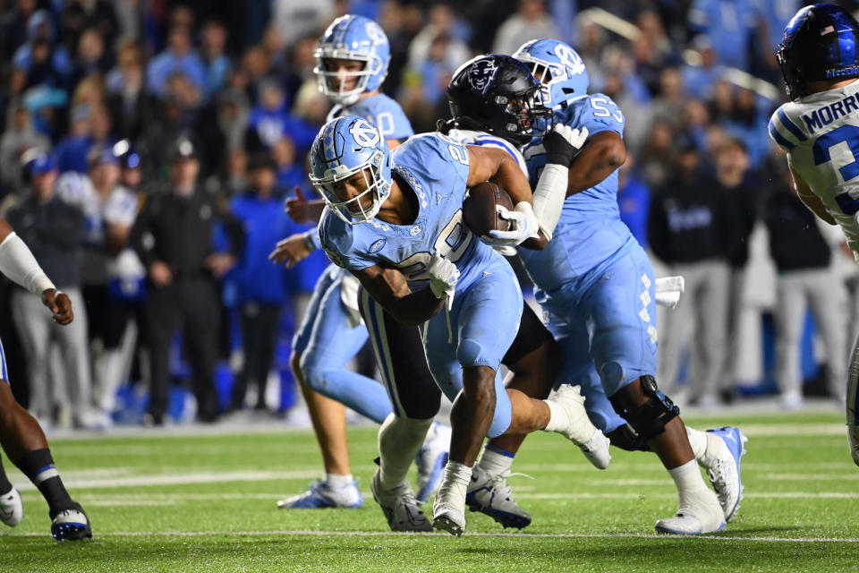 Nov 11, 2023; Chapel Hill, North Carolina, USA; North Carolina Tar Heels running back Omarion Hampton (28) with the ball in the second overtime at Kenan Memorial Stadium. Mandatory Credit: Bob Donnan-USA TODAY Sports