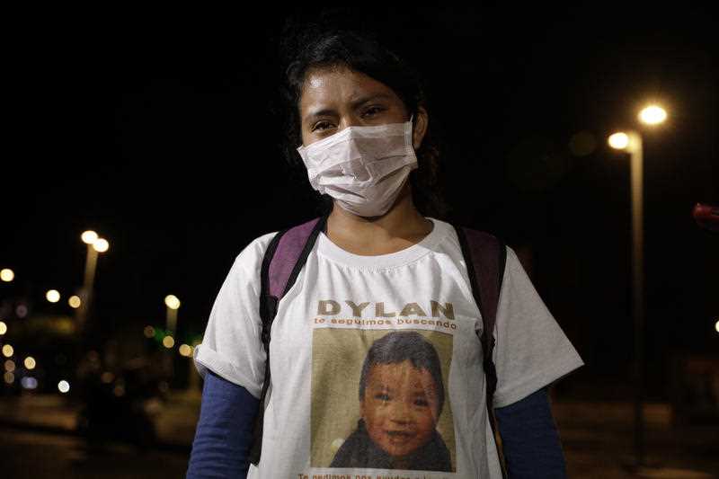 Juana Pérez wears a t-shirt asking for info about her missing son Dylan, 2.