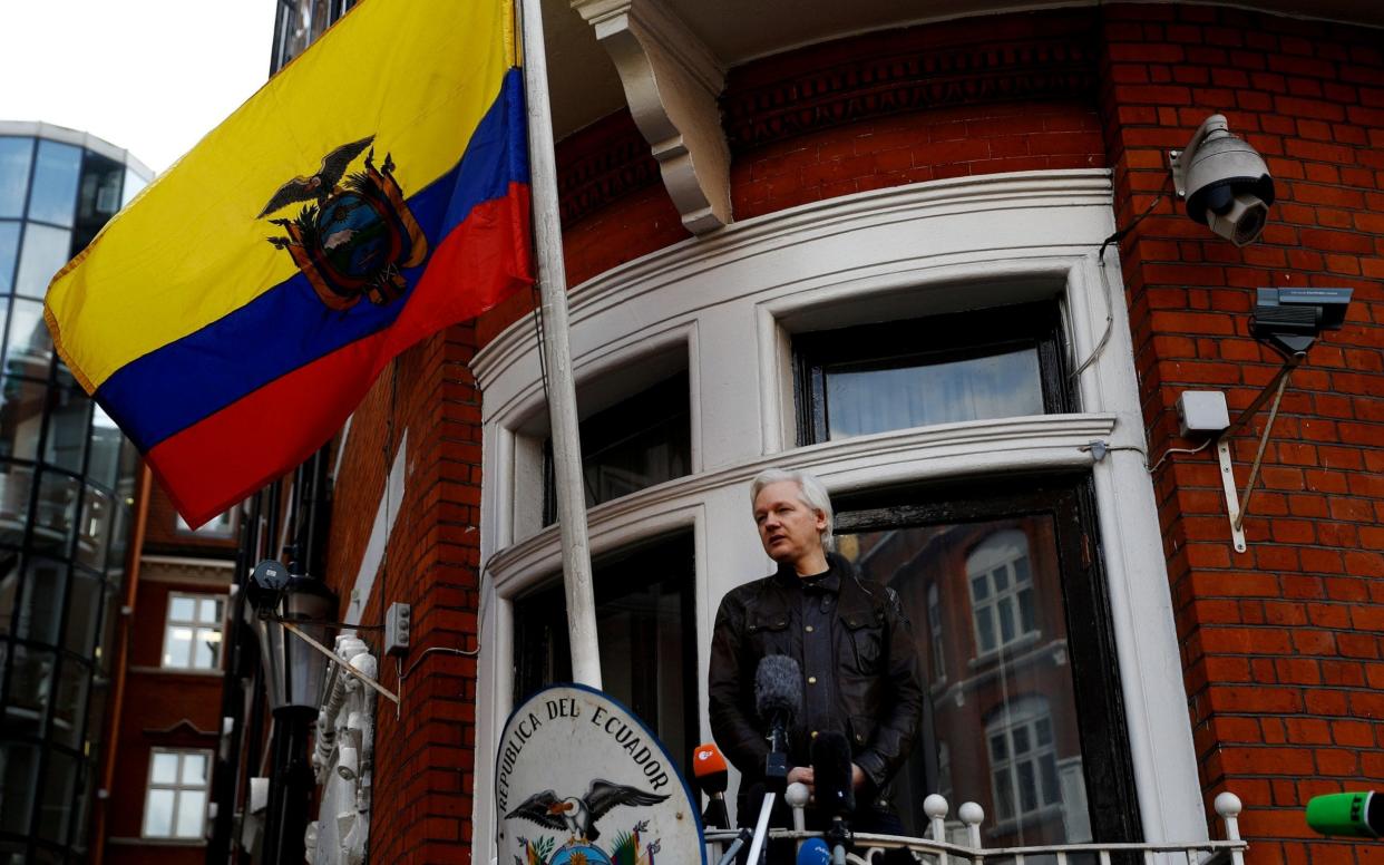 Julian Assange, speaking on the balcony of the Ecuadorean embassy in Knightsbridge in May 2017 - REUTERS