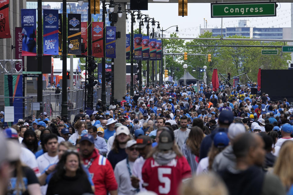 Crowds visit on the third day of the NFL football draft, Saturday, April 27, 2024, in Detroit. (AP Photo/Jeff Roberson)