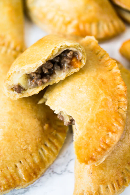 <p>Sim's Home Kitchen</p><p>This easy Nigerian meat pie recipe will have your family and friends coming back for more! Learn how to make meat pie dough soft and fill each pie with a homemade delicious savory minced beef, carrot and potato filling. Serve meat pie as a snack or appetizer.</p><p><strong>Get the recipe: <a href="https://simshomekitchen.com/nigerian-meat-pie-recipe/" rel="nofollow noopener" target="_blank" data-ylk="slk:Nigerian Meat Pie Recipe;elm:context_link;itc:0;sec:content-canvas" class="link ">Nigerian Meat Pie Recipe</a></strong></p>