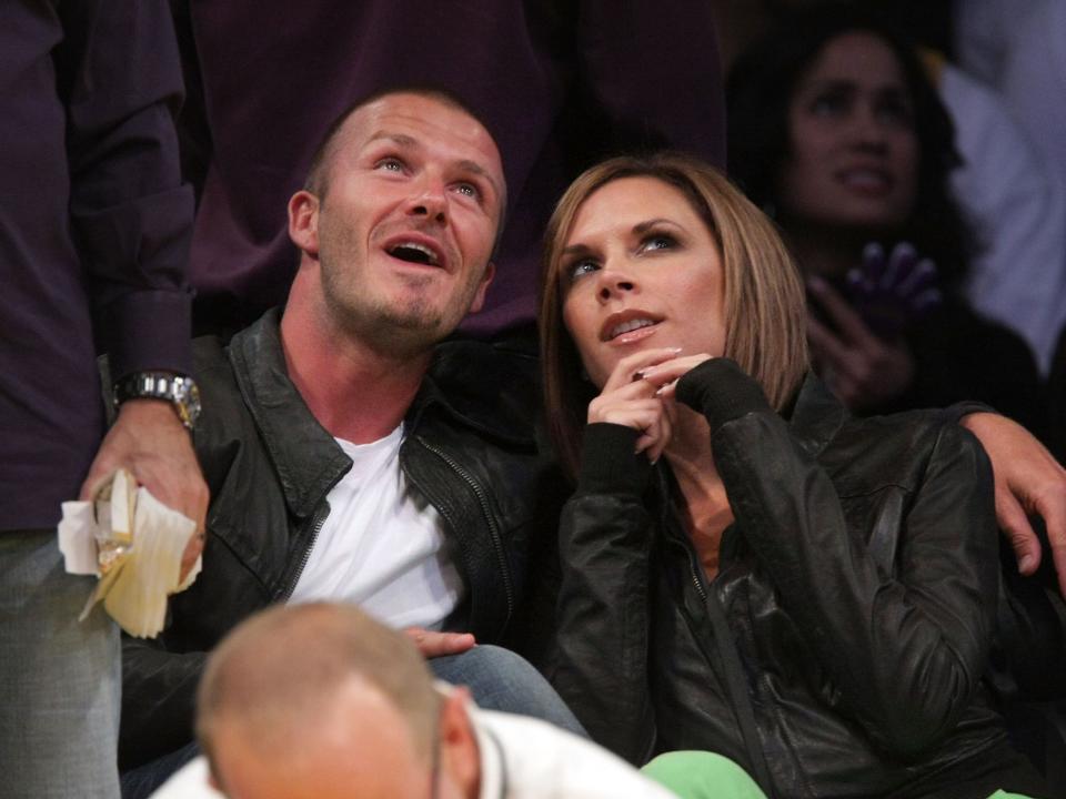 David Beckham and Victoria Beckham attend a Lakers game on May 23, 2008 in Los Angeles, California.
