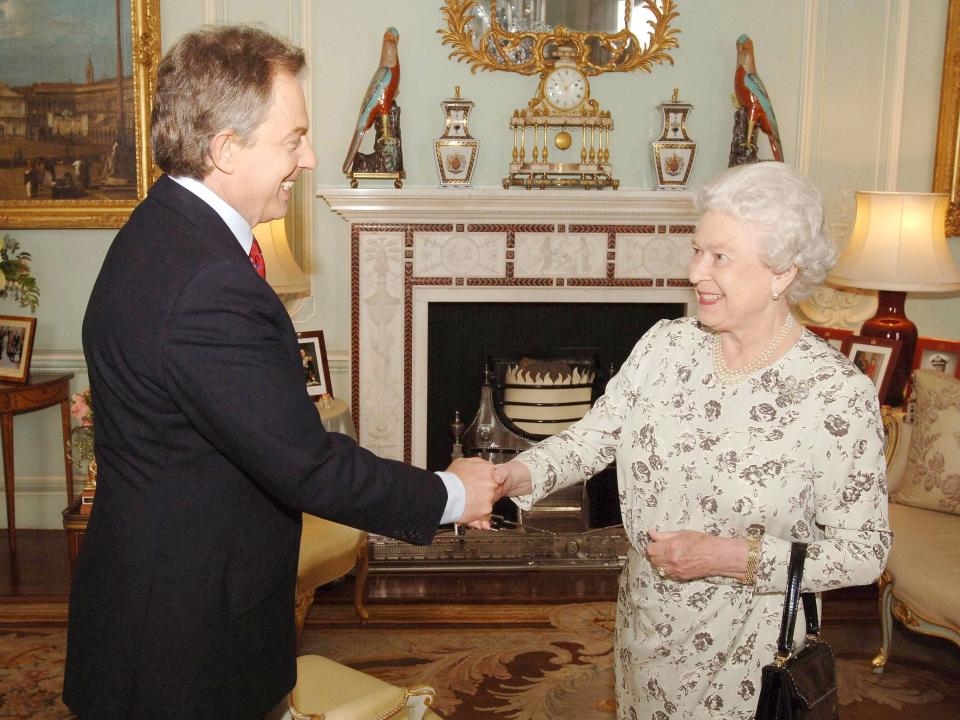 Tony Blair and Queen Elizabeth in 2005, shaking hands