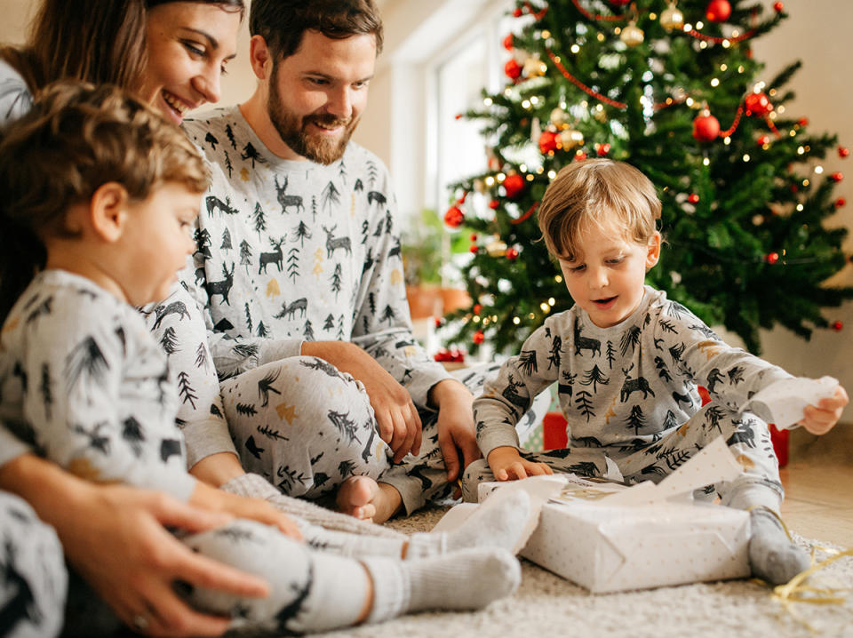 Family in matching Christmas PJs.