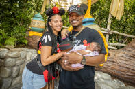 <p>NE-YO and wife Crystal Renay take daughter Isabella Rose to Disneyland in Anaheim on July 22.</p>