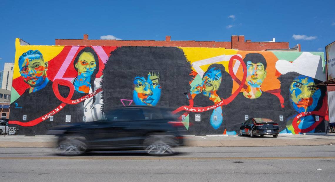 Isaac Tapia and Rodrigo “Rico” Alvarez created the mural “World AIDS Day” at 18th and Walnut streets.