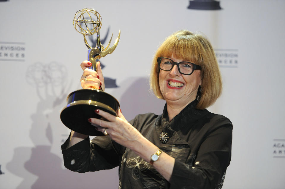 Gemma Jackson poses backstage with her award for outstanding art direction for a single-camera series for "Game of Thrones" at the 2012 Creative Arts Emmys at the Nokia Theatre on Saturday, Sept. 15, 2012, in Los Angeles. (Photo by Chris Pizzello/Invision/AP)