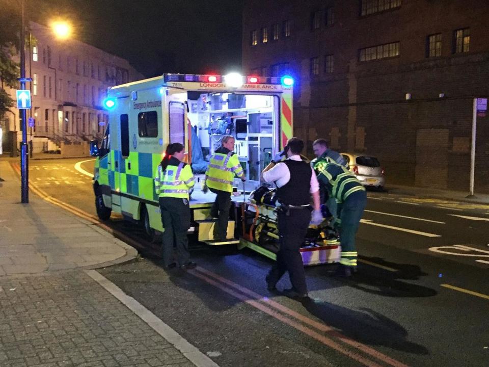 Emergency services are seen near Finsbury Park after a vehicle hit pedestrians on 19 June (Reuters)