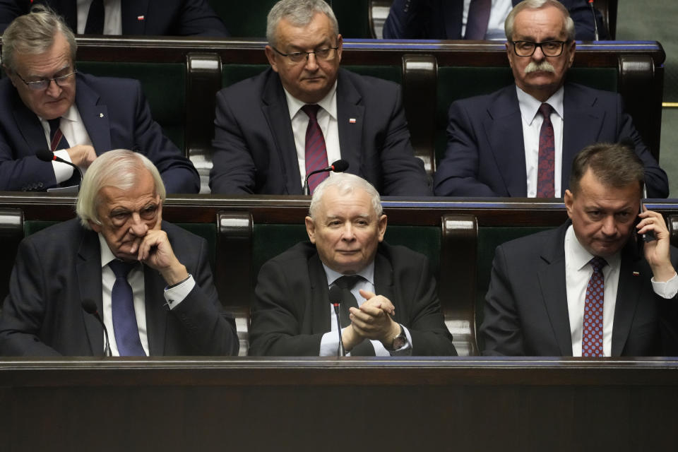 The leader of Poland's ruling conservative party, Jaroslaw Kaczynski, front row center, attends the first session of the lower house, or Sejm, of the newly-elected parliament in Warsaw, Poland, on Monday, 13 November 2023 after an election last month heralded a change of course for the Central European nation at a time of war across the border in Ukraine. Prime Minister Mateusz Morawiecki is to tender his resignation, but President Andrzej Duda is to entrust Morawiecki with the mission of forming a new government, a task expected to fail because after the election Morawiecki's party lacks parliament majority. (AP Photo/Czarek Sokolowski)