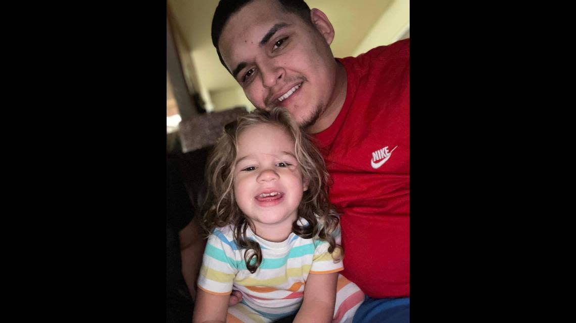 Moses Portillo, pictured here in a 2021 photo with his daughter, was shot dead by a Pierce County deputy in January during a traffic stop.