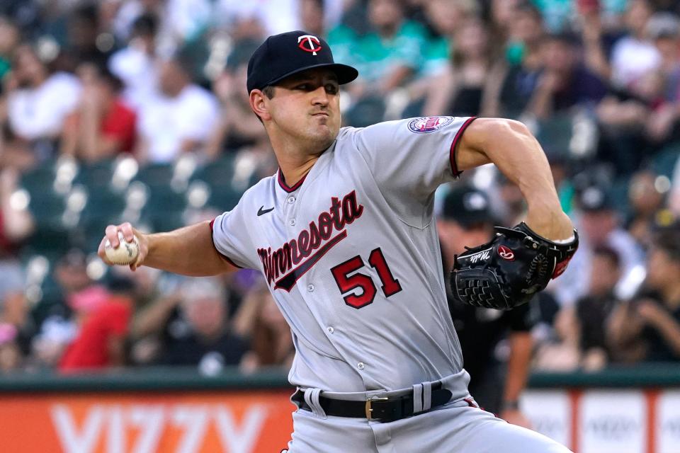 Minnesota Twins starting pitcher Tyler Mahle throws to a Chicago White Sox batter during the first inning of a baseball game in Chicago, Saturday, Sept. 3, 2022. (AP Photo/Nam Y. Huh)