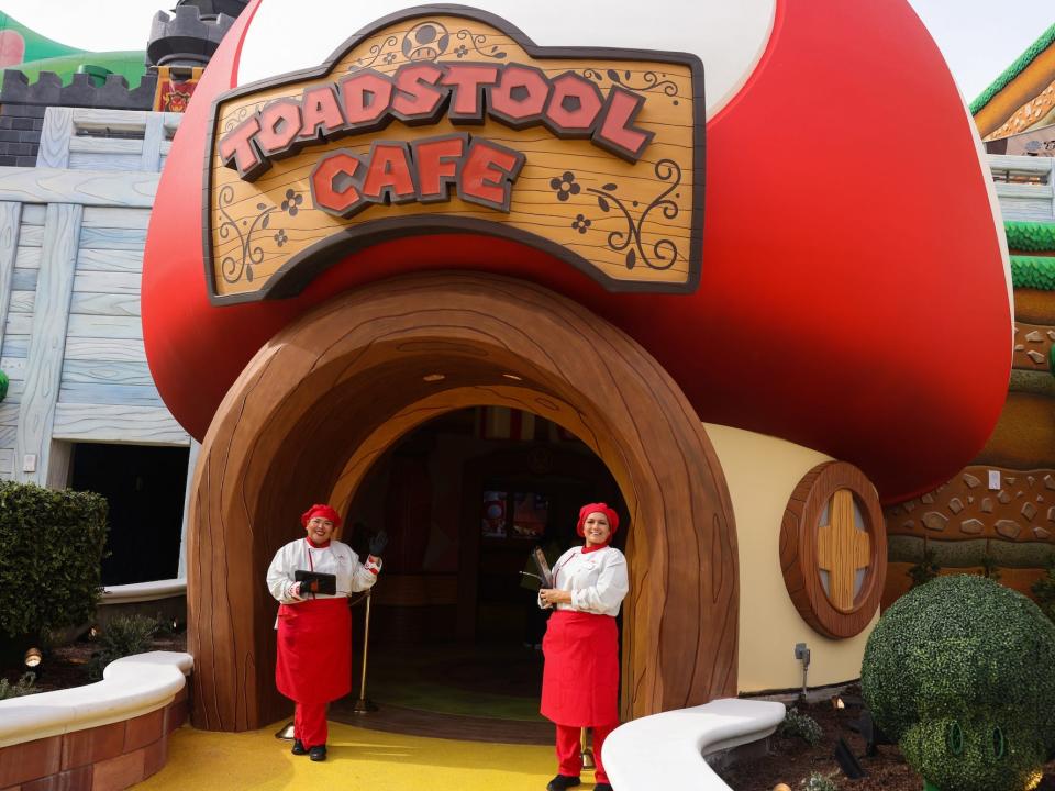 Greeters await people for lunch at the Toadstool Cafe at Super Nintendo World on Thursday, Jan. 12, 2023 in Los Angeles, CA.