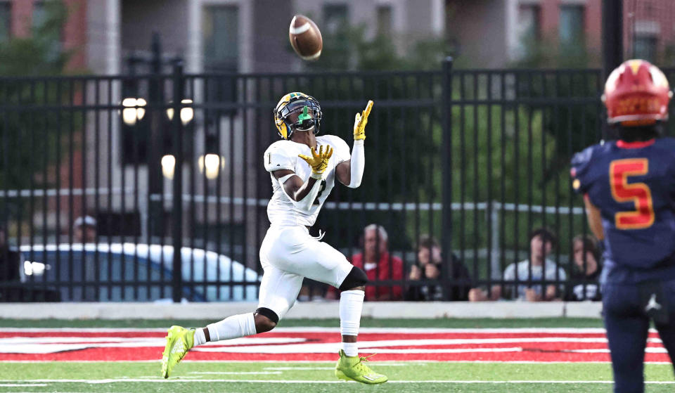 Taft wide receiver Tayshawn Banks catches a touchdown pass during the Senators, win over Purcell Marian Friday Sept. 15, 2023.