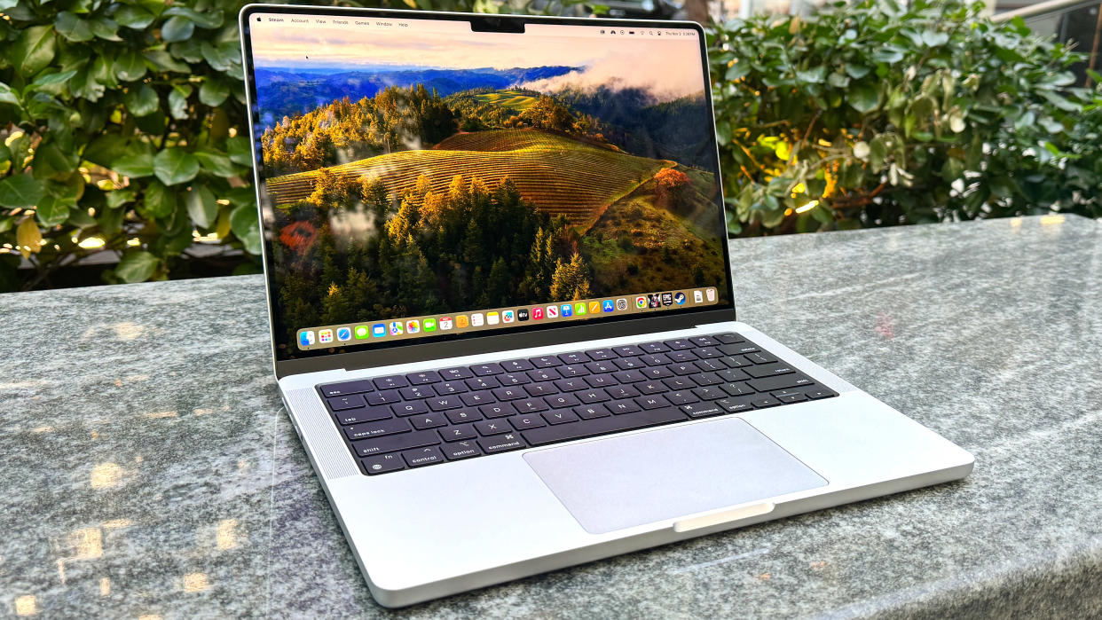  MacBook Pro 14-inch M3 on marble bench . 