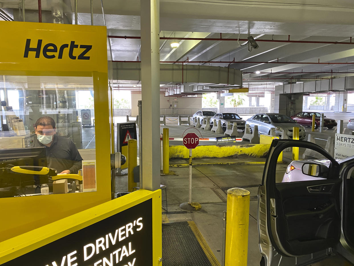 Car exiting the empty car rental area at Hertz«s  Car Rental Parking  area at Miami International Airport (Photo by: Kike Calvo/Universal Images Group via Getty Images)