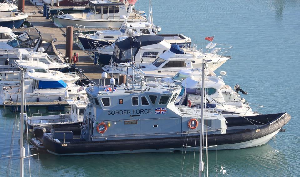 Border Force patrol vessel ‘Hunter’ in Dover Marina, Kent, after three Rigid-hulled inflatable boats (RHIB), thought to have been used to transport migrants, where brought into the harbour as the Home Office confirmed more migrants have been picked up from boats off the Kent coast on Sunday night. (PA)