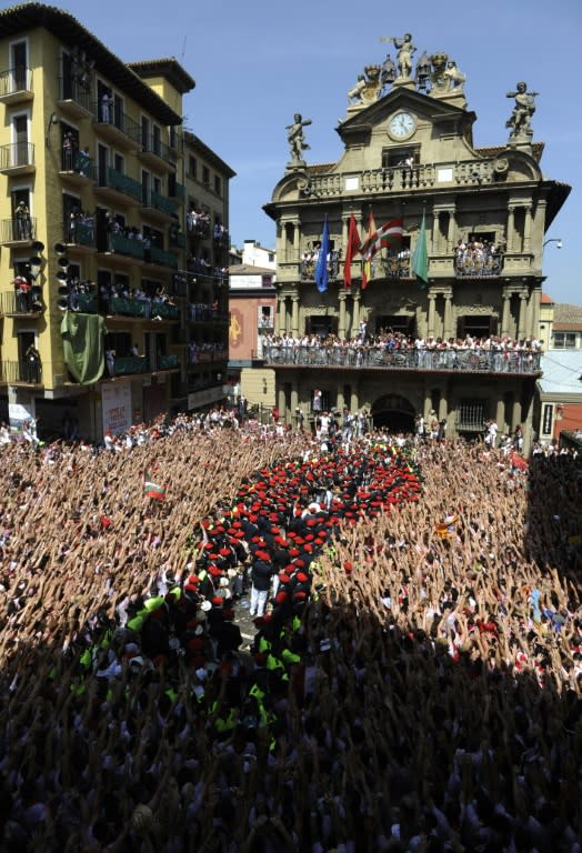 A band performs during the opening 'chupinazo' celebration that marks the start of the San Fermin Festival, in front of the Town Hall of Pamplona, northern Spain, on July 6, 2015