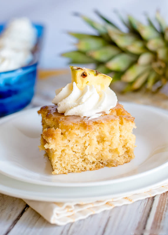 <p><strong>Pineapple Poke Cake</strong><br> Get the recipe <a href="https://www.courtneyssweets.com/pineapple-poke-cake/" rel="nofollow noopener" target="_blank" data-ylk="slk:here;elm:context_link;itc:0;sec:content-canvas" class="link "><em><strong>here</strong></em></a></p>