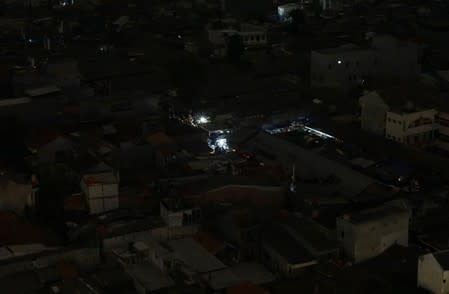 A traditional market is seen during a major power blackout in Jakarta