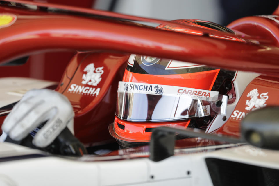 Alfa Romeo driver Kimi Raikkonen, of Finland, pulls out of the garage during first practice session for the Formula One U.S. Grand Prix auto race at the Circuit of the Americas, Friday, Nov. 1, 2019, in Austin, Texas. (AP Photo/Darron Cummings)