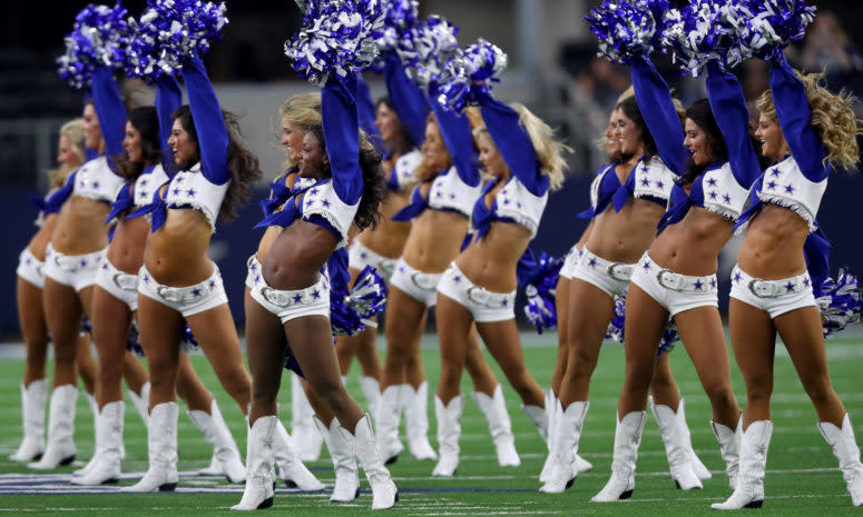 Dallas Cowboys cheerleaders performing during a game.