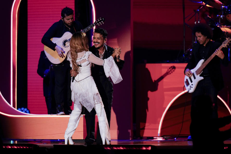 Kany Garcia, left, and Christian Nodal perform during the 24th annual Latin Grammy Awards in Seville, Spain, Thursday, Nov. 16, 2023. (Photo by Jose Breton/Invision/AP)