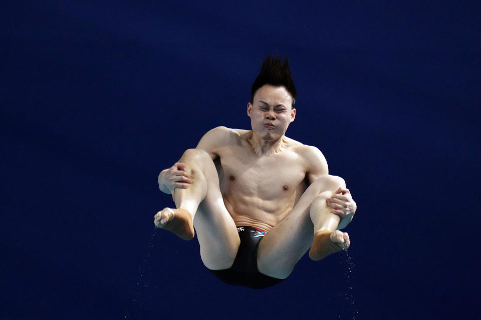 Xie Siyi of China competes during the men's 3m springboard diving final at the World Aquatics Championships in Doha, Qatar, Wednesday, Feb. 7, 2024. (AP Photo/Hassan Ammar)