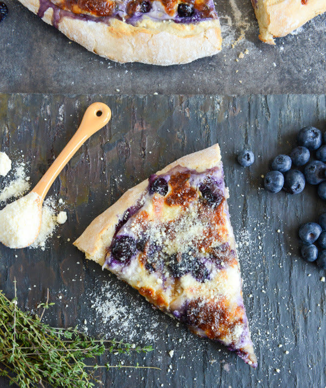 <strong>Get the <a href="http://www.howsweeteats.com/2013/08/blueberry-pizza-with-whipped-ricotta-caramelized-shallots/" target="_blank">Blueberry Pizza with Whipped Ricotta and Caramelized Shallots recipe</a> from How Sweet It Is</strong>
