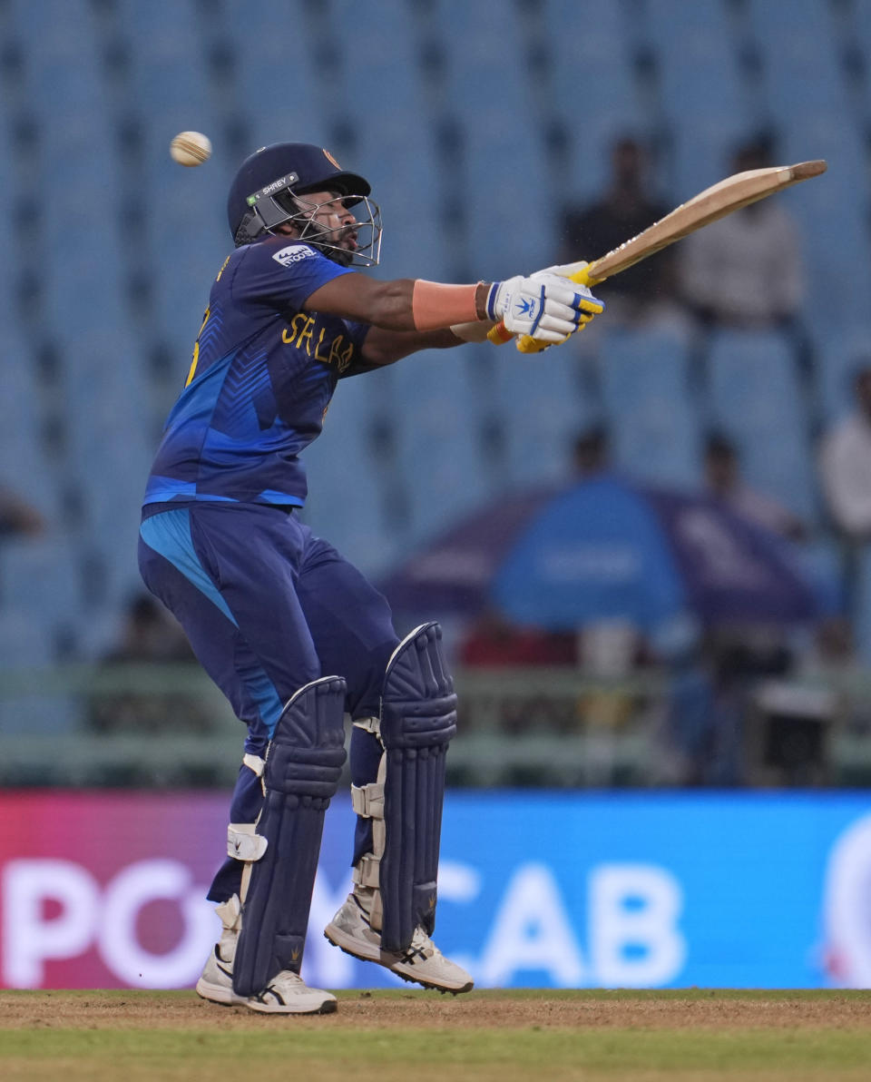 Sri Lanka's Sadeera Samarawickrama avoids a bouncer during the ICC Men's Cricket World Cup match between Sri Lanka and Netherlands in Lucknow, India, Saturday, Oct. 21, 2023. (AP Photo/Altaf Qadri)