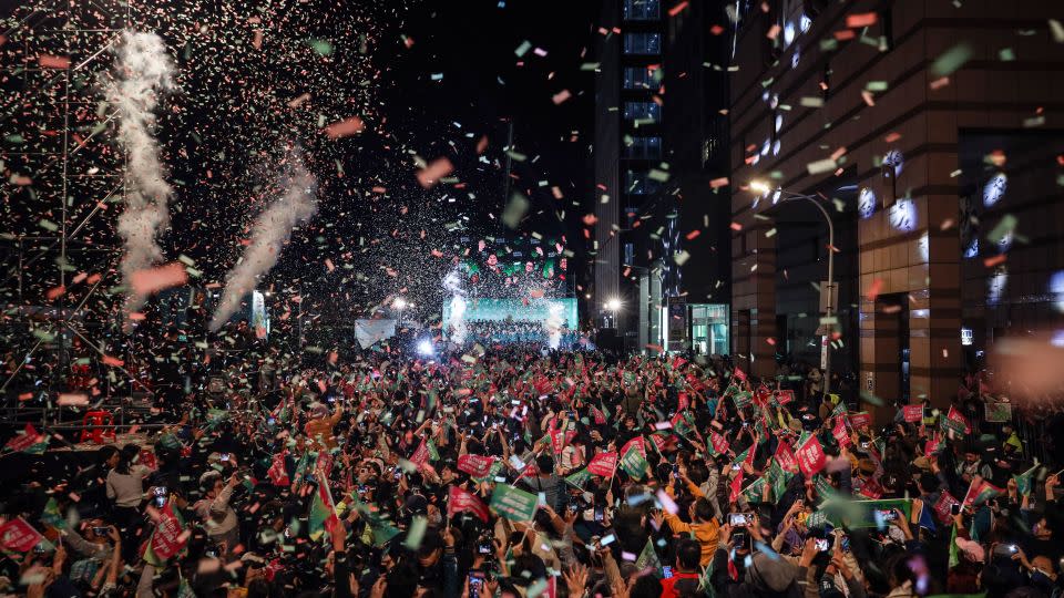 Confetti flies over crowds as Lai Ching-te speaks to supporters at a rally at the DPP's headquarters on January 13, 2024 in Taipei, Taiwan. - Annice Lyn/Getty Images