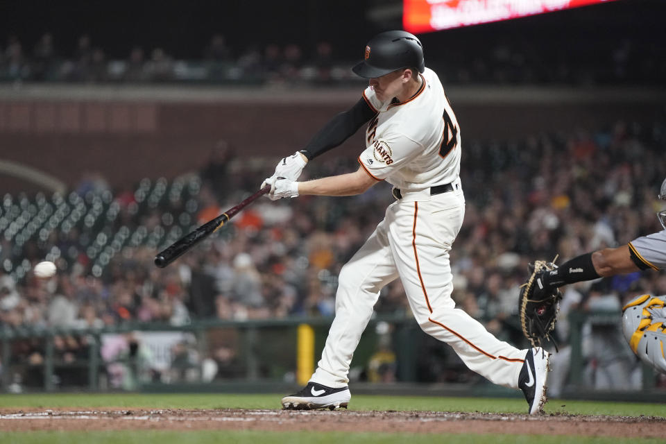 San Francisco Giants' Corban Joseph hits a grounder that scored a run against the Pittsburgh Pirates during the fifth inning of a baseball game Wednesday, Sept. 11, 2019, in San Francisco. (AP Photo/Tony Avelar)