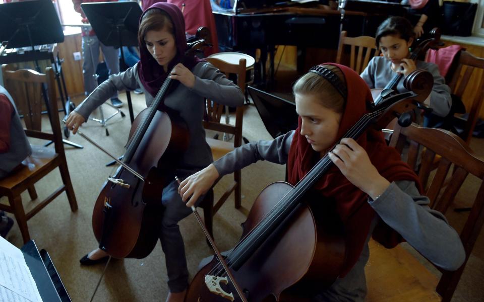 Students play during an orchestra practice session at the Afghanistan National Institute of Music - AFP/Getty Images