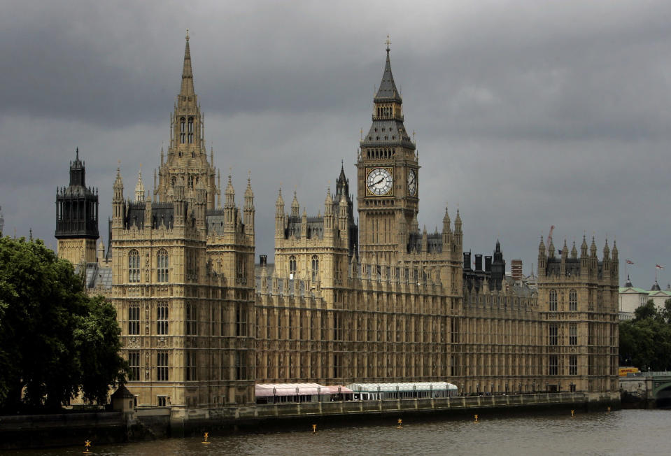 FILE - In this Thursday, July 26, 2007 file photo, a general view of the Houses of Parliament on the river Thames in London. British Prime Minister Theresa May has announced she will step down as leader of the Conservative Party on June 7, 2019 starting a process that will lead to a Conservative Party leadership contest and a new British prime minister who will lead the government during the Brexit process. (AP Photo/Kirsty Wigglesworth, File)