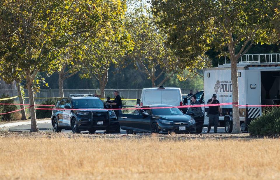 Modesto Police investigate a possible death in the parking lot of St. Stanislaus Catholic Church on Maze Boulevard in Modesto, Calif., on Saturday, September 24, 2022. 