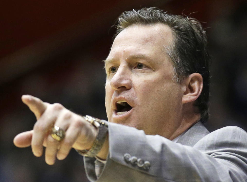 North Carolina State coach Mark Gottfried talks to his players during the second half against Xavier in a first-round game of the NCAA college basketball tournament, Tuesday, March 18, 2014, in Dayton, Ohio. (AP Photo/Al Behrman)