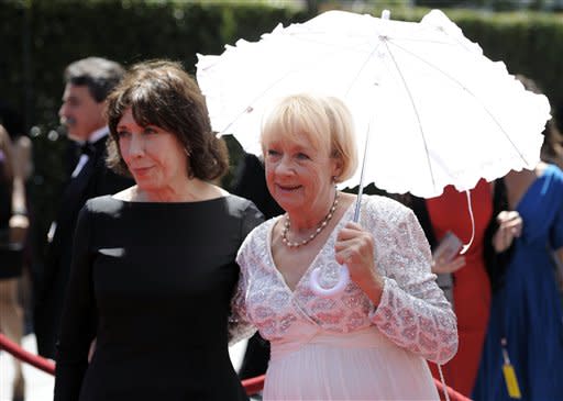 Lily Tomlin and Kathryn Joosten arrive at the Creative Arts Emmy Awards on Saturday, Aug. 21, 2010 in Los Angeles. (AP Photo/Chris Pizzello)