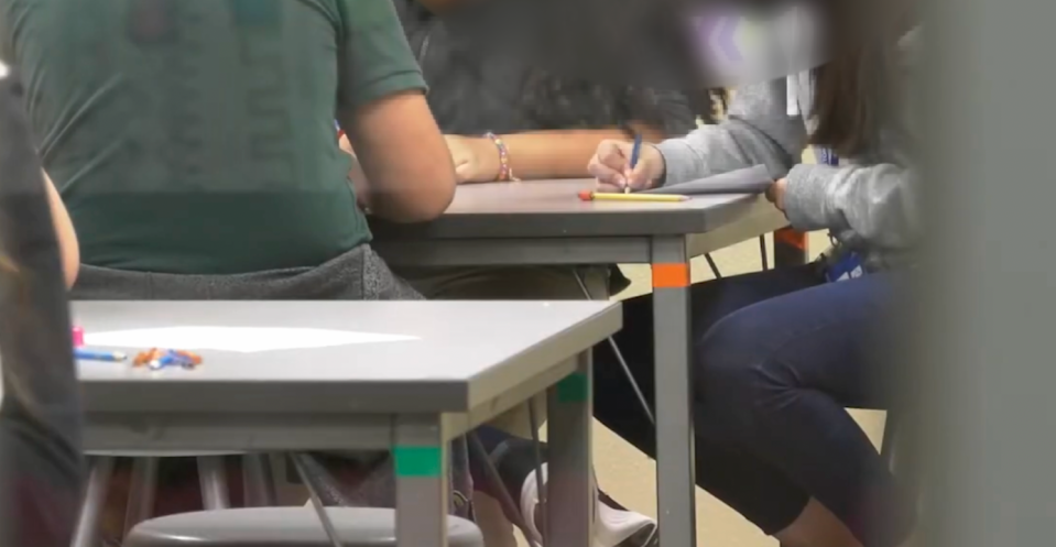 students working at a desk